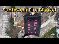Abbiamo testato una coperta ignifuga su un'auto elettrica in fiamme: i risultati sono sorprendenti!